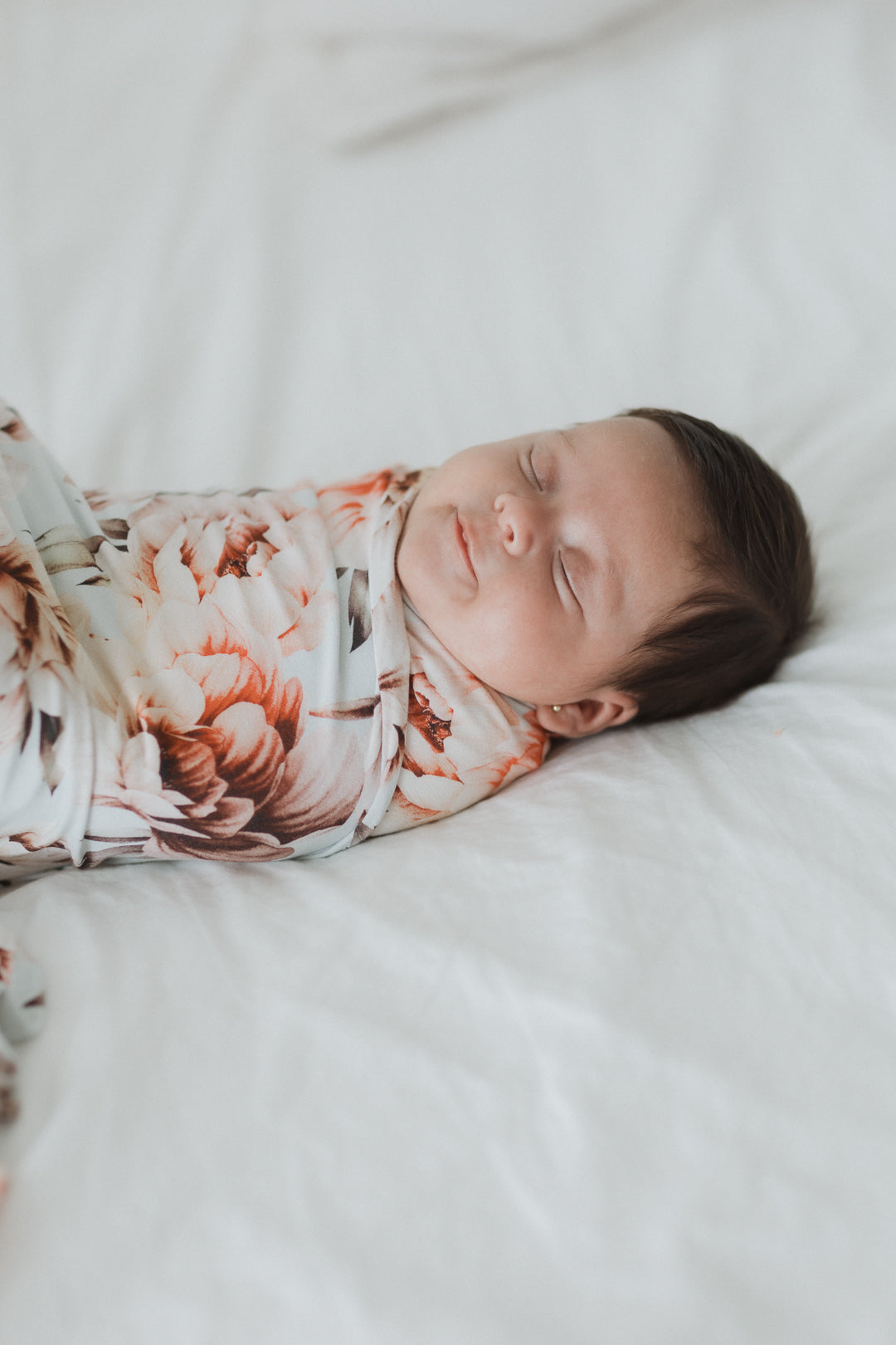 Peonia Swaddle con moño