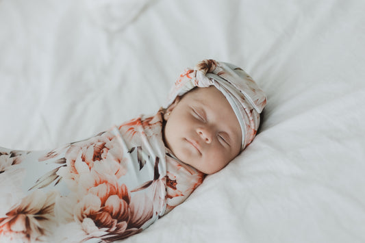Peonia Swaddle con moño